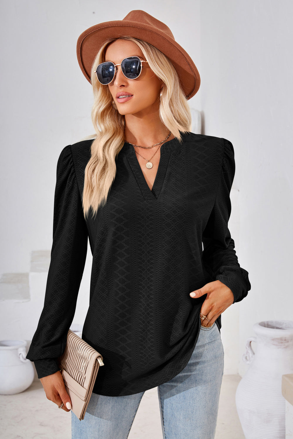 Textured knit split-neck puff sleeve blouse