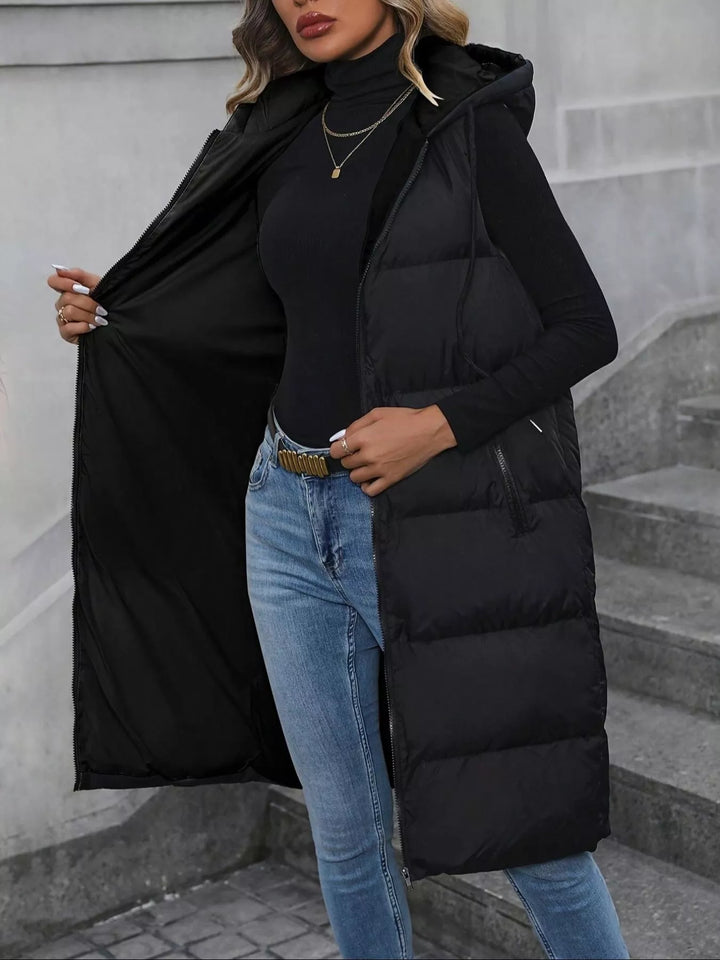 Longline hooded puffer vest with zip pockets
