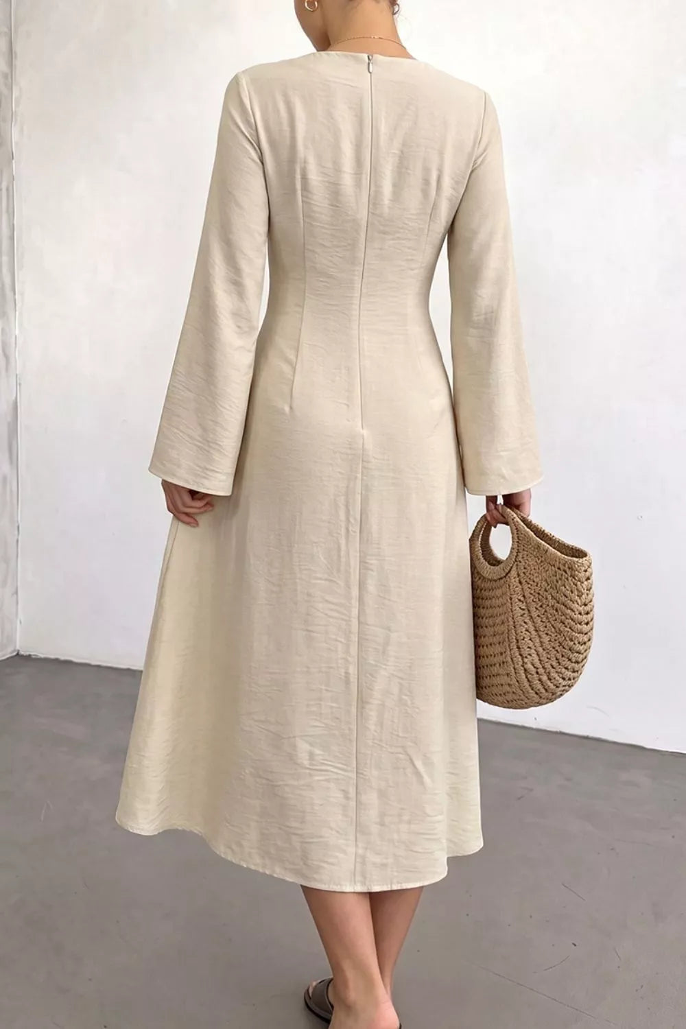 Ruched waist midi dress with rosette and long sleeves