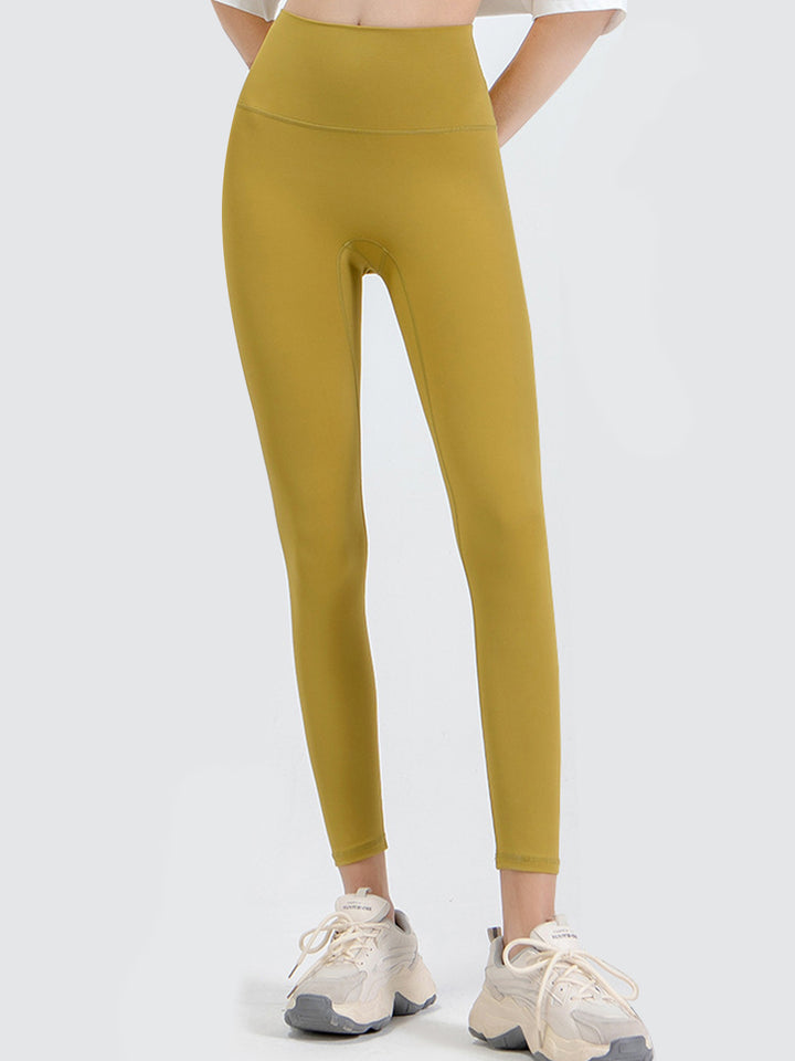 Banana Yellow High-rise sports leggings with wide yoke waistband