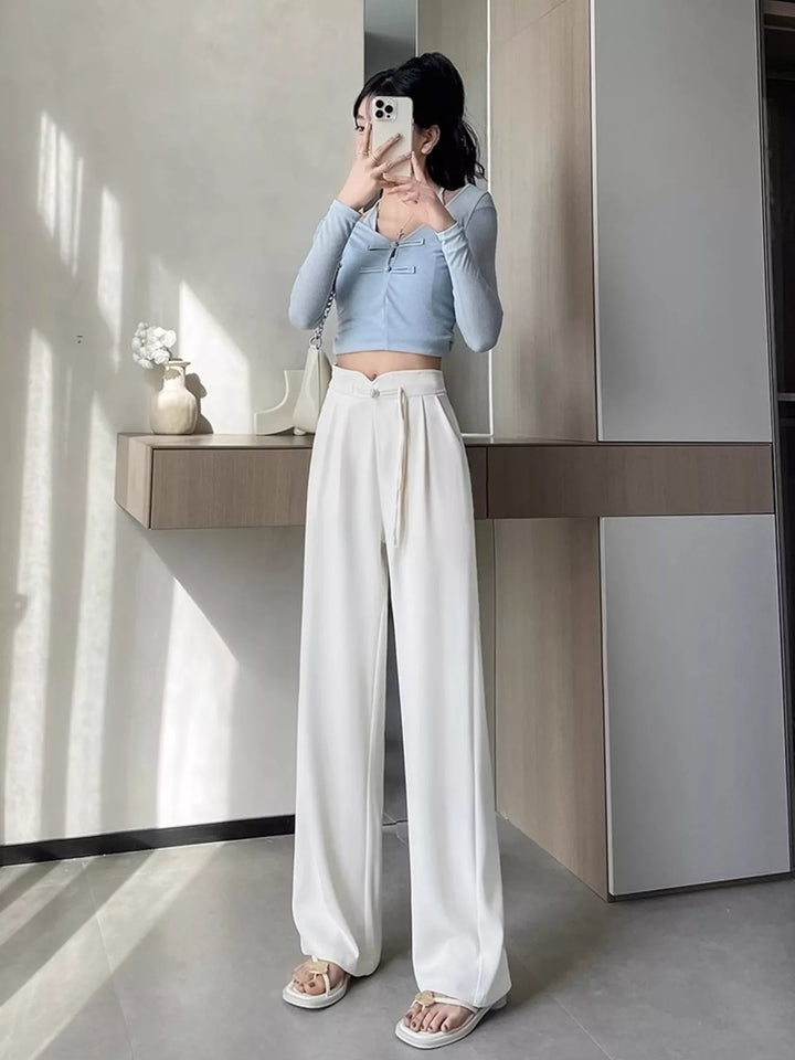 High-rise wide-leg pants with pleated front and tie waist