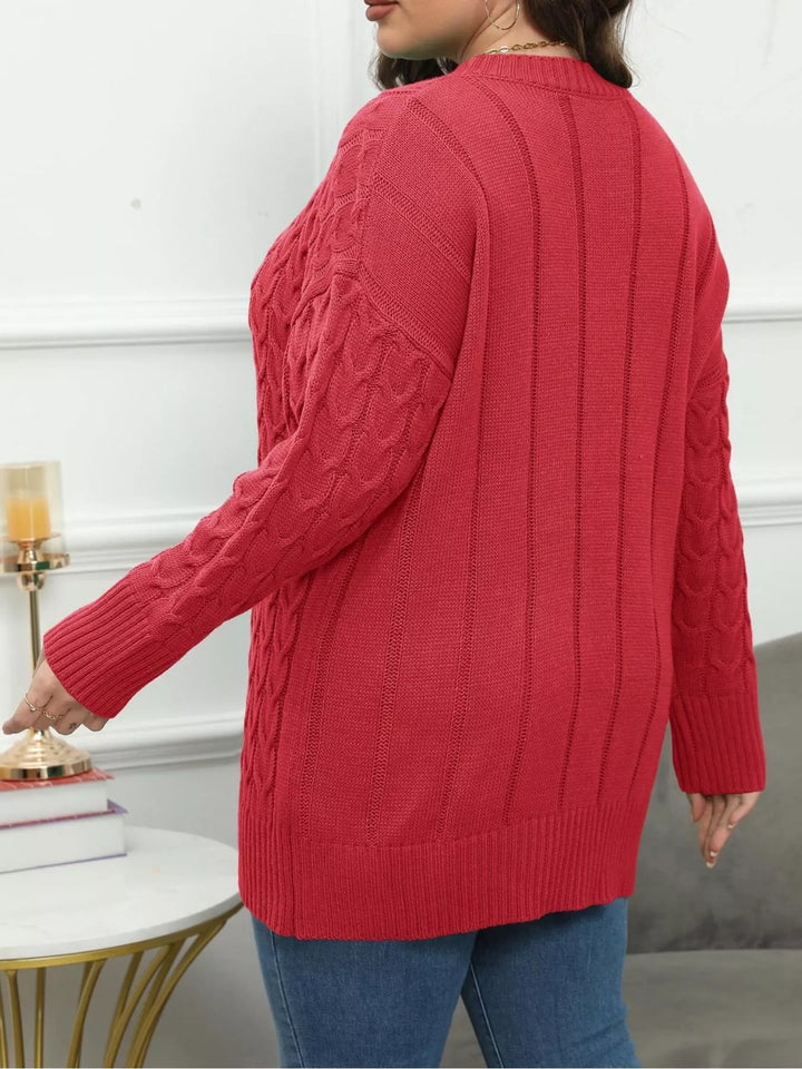Cable knit dropped shoulder sweater with floral buttons