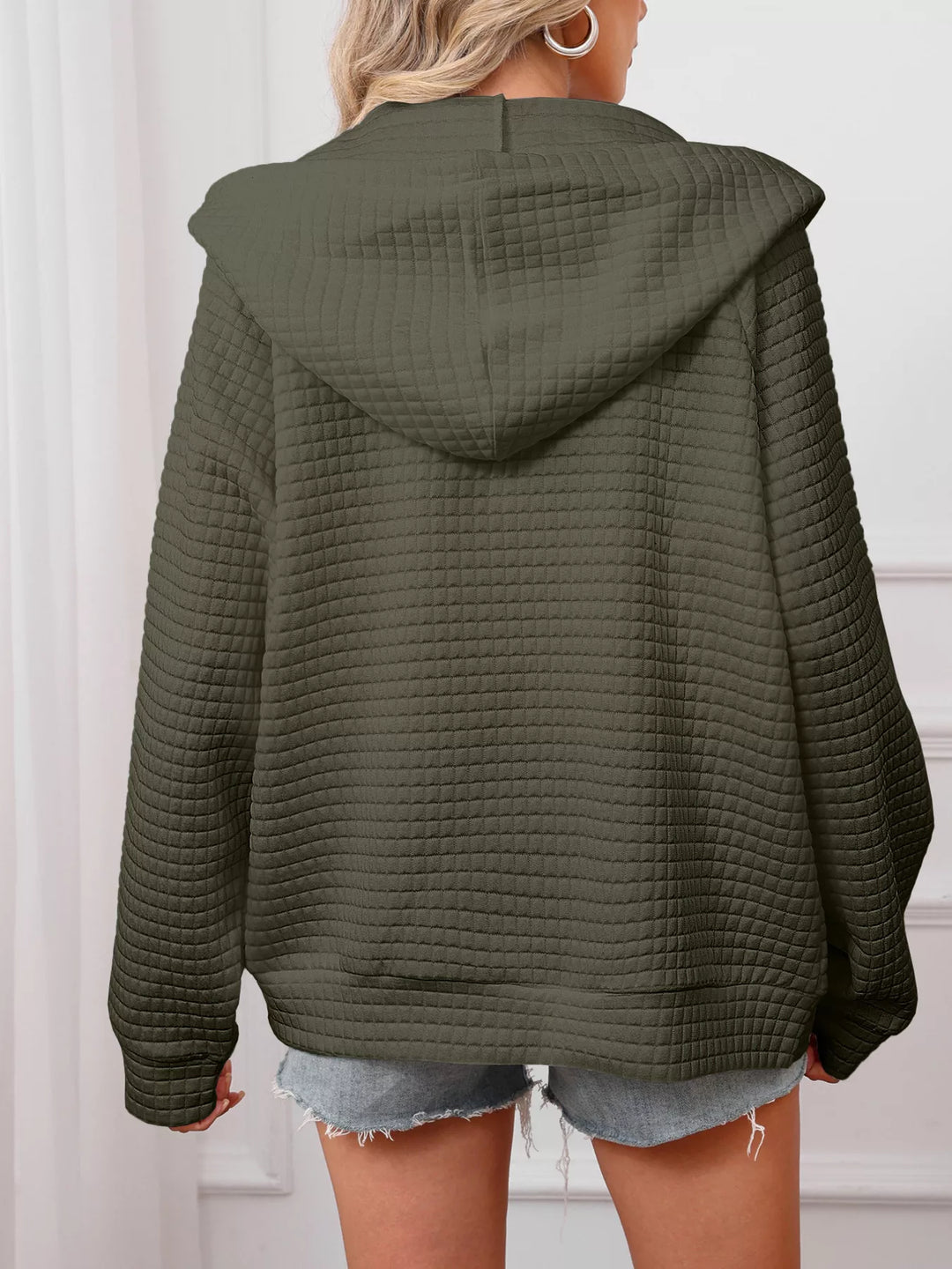 Textured quilted zip-up hooded jacket with pockets