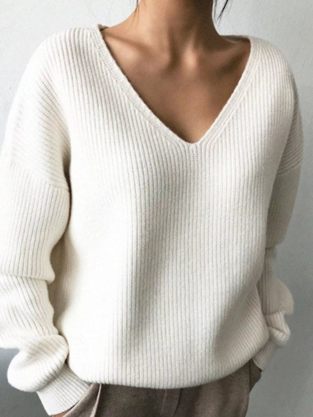 Ribbed knit V-neck sweater with dropped shoulders