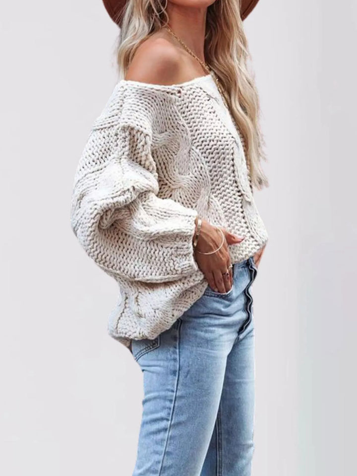 Oversized chunky cable knit pullover with wide boat neck