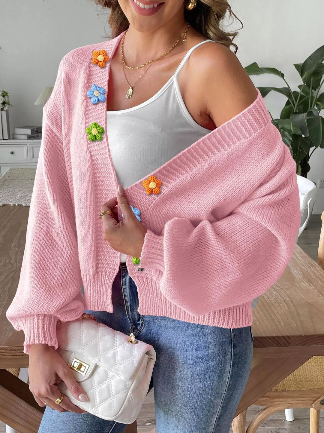 Floral applique open front knit cardigan with ribbed trim