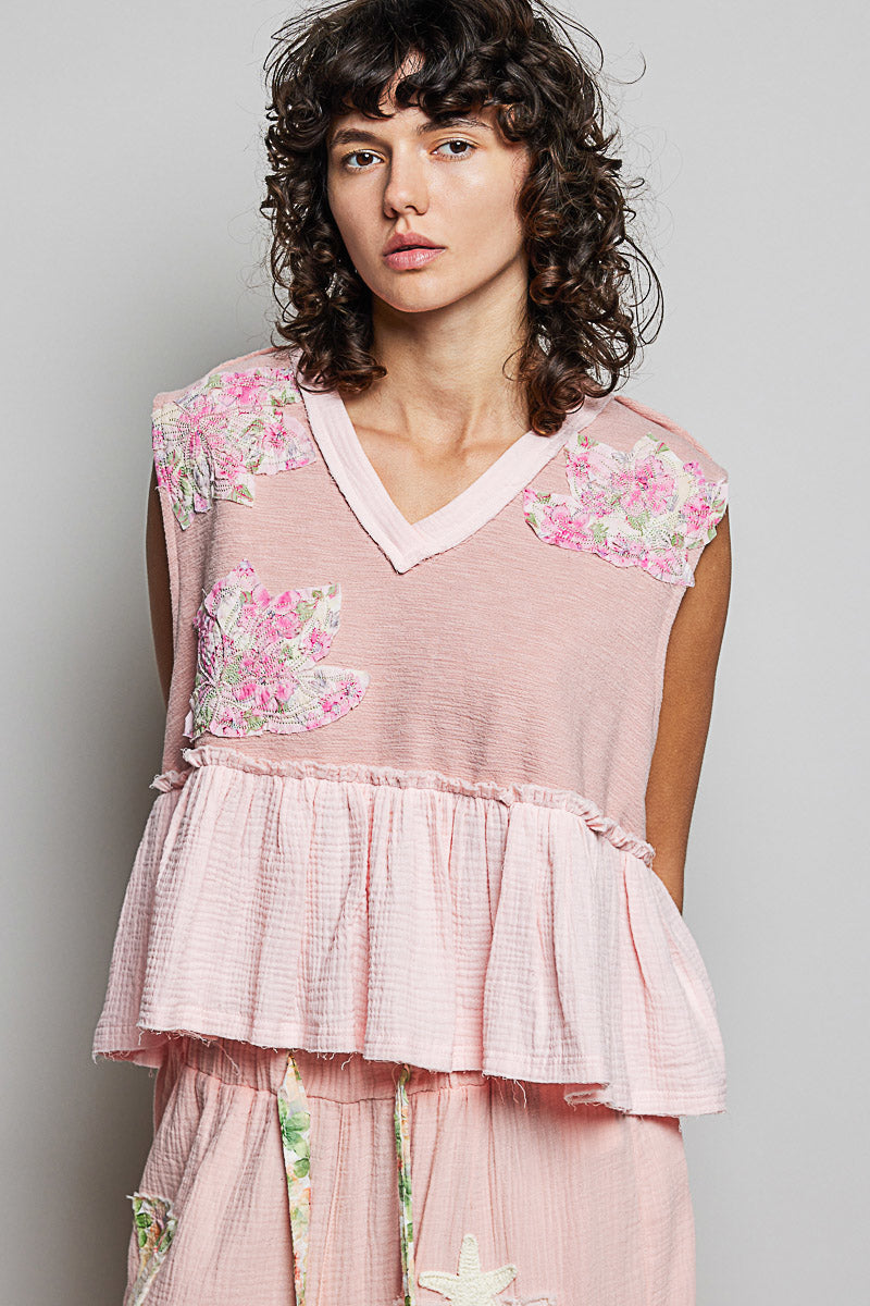 Floral patch V-neck sleeveless top with ruffle hem and raw-edge detail