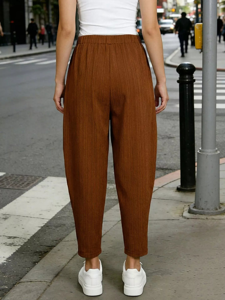 Plus size elastic waist harem pants with side pockets