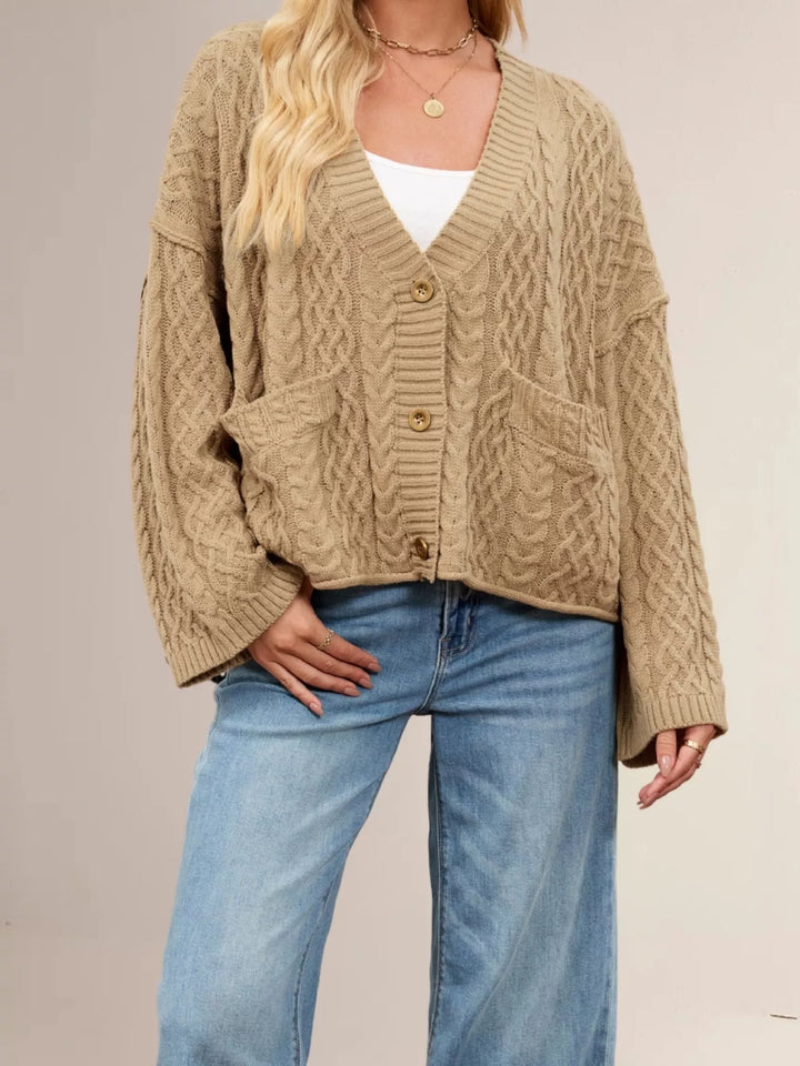 Cable knit button-front cardigan with patch pockets