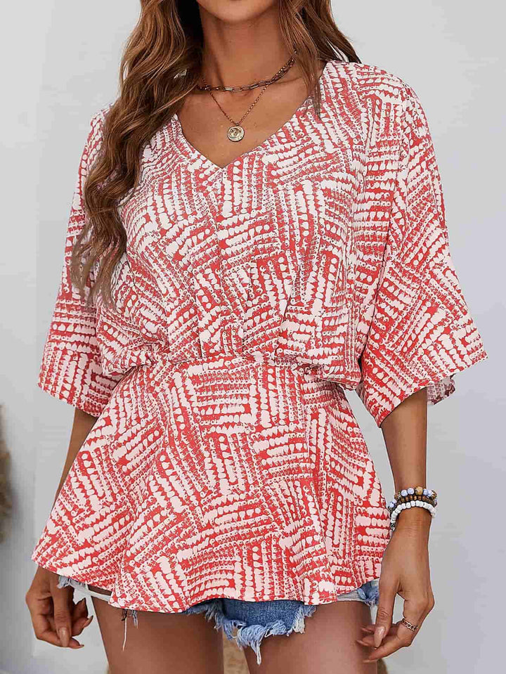 Abstract print V-neck dolman sleeve blouse