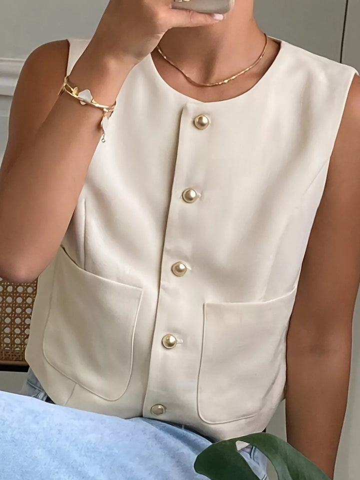 Button-down sleeveless vest with gold dome buttons and patch pockets