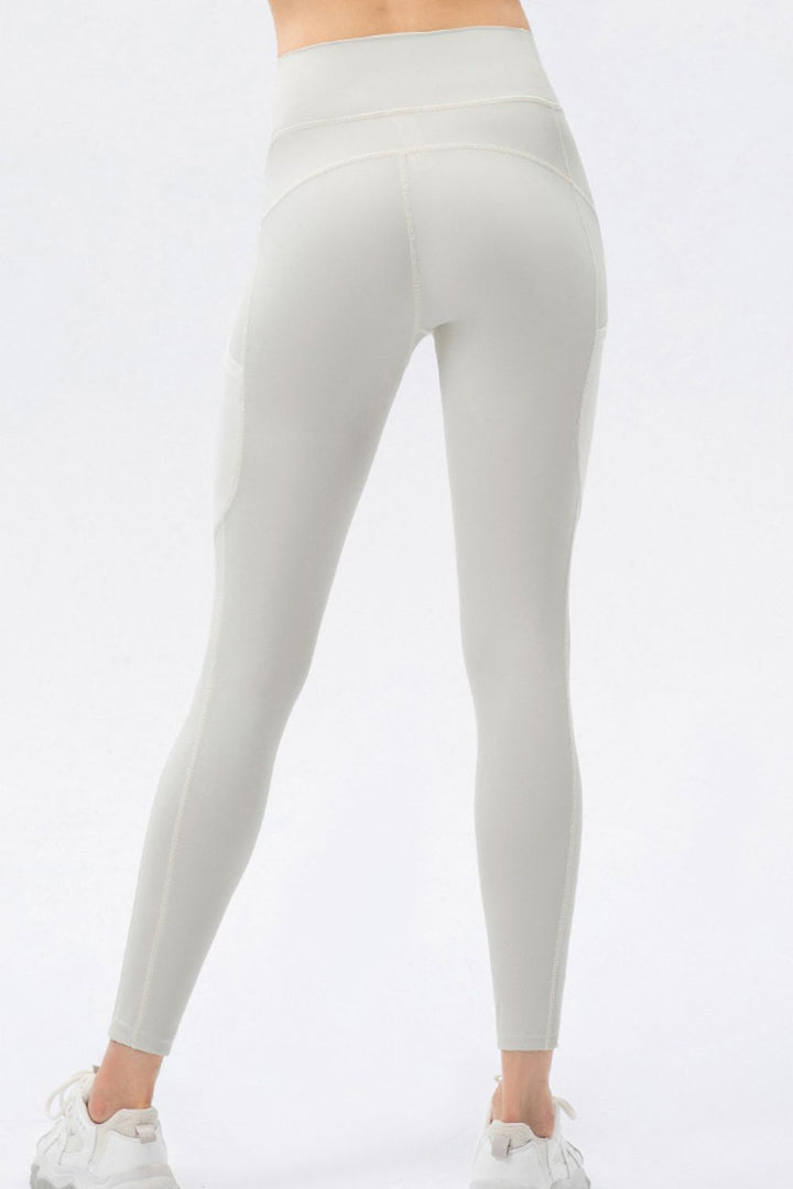 High-rise workout leggings with mesh side pockets