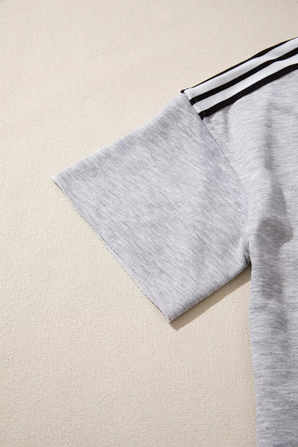 Relaxed fit tee with varsity shoulder stripes