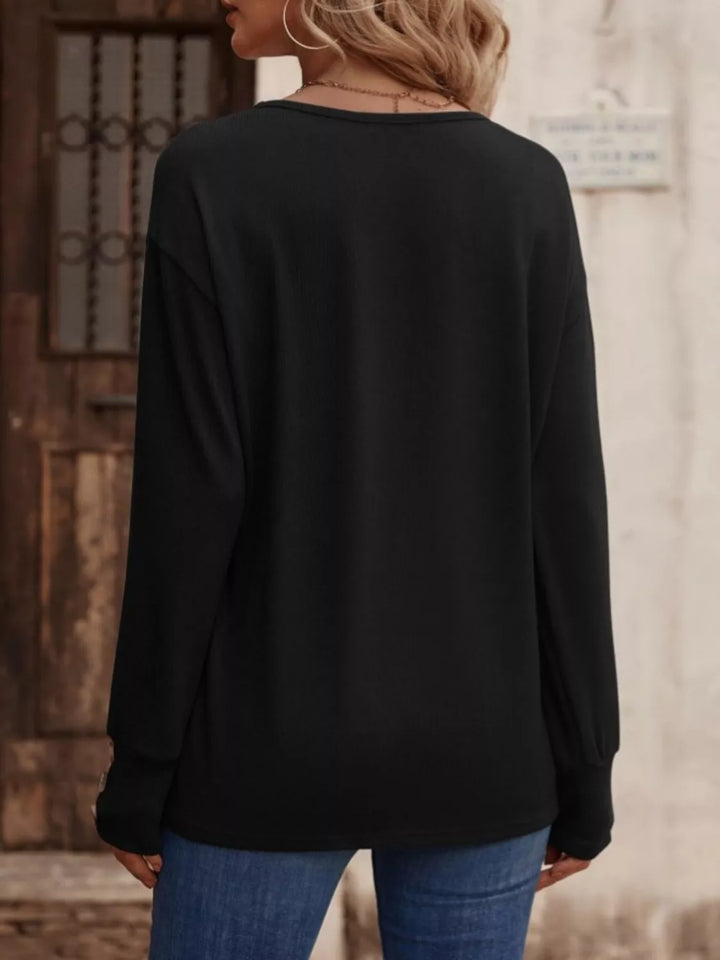 V-neck long sleeve top with button cuffs