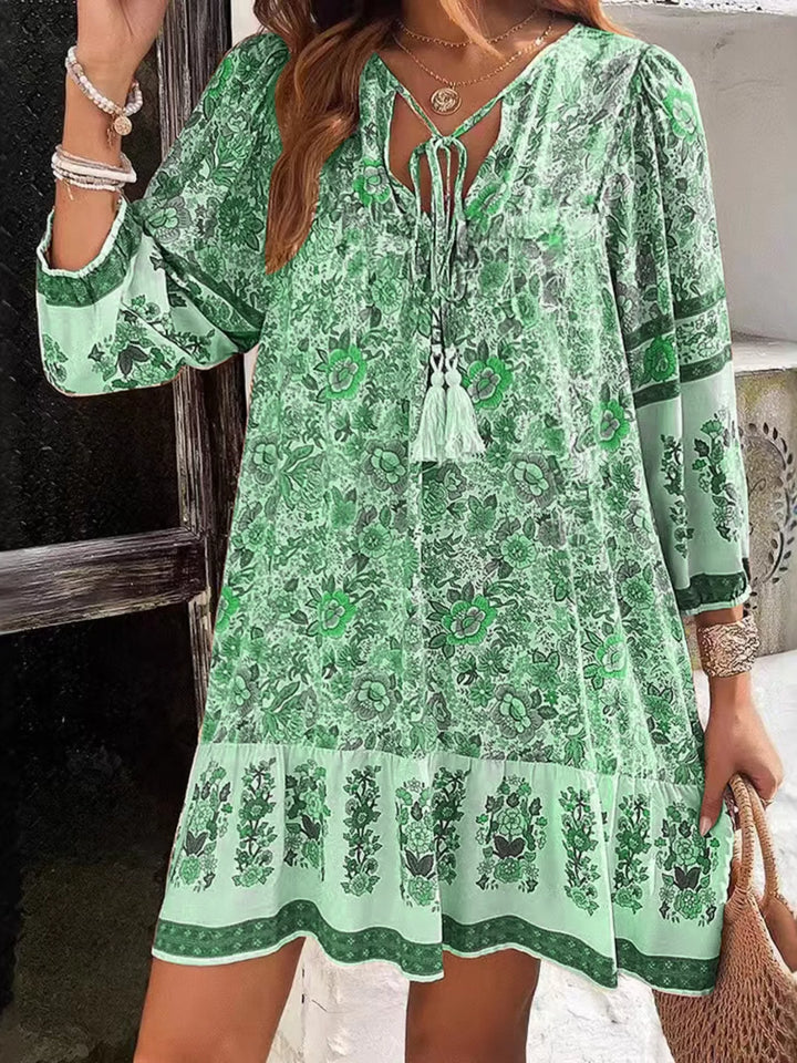 Gum Leaf Boho floral v-neck mini dress with tassel tie and long sleeves
