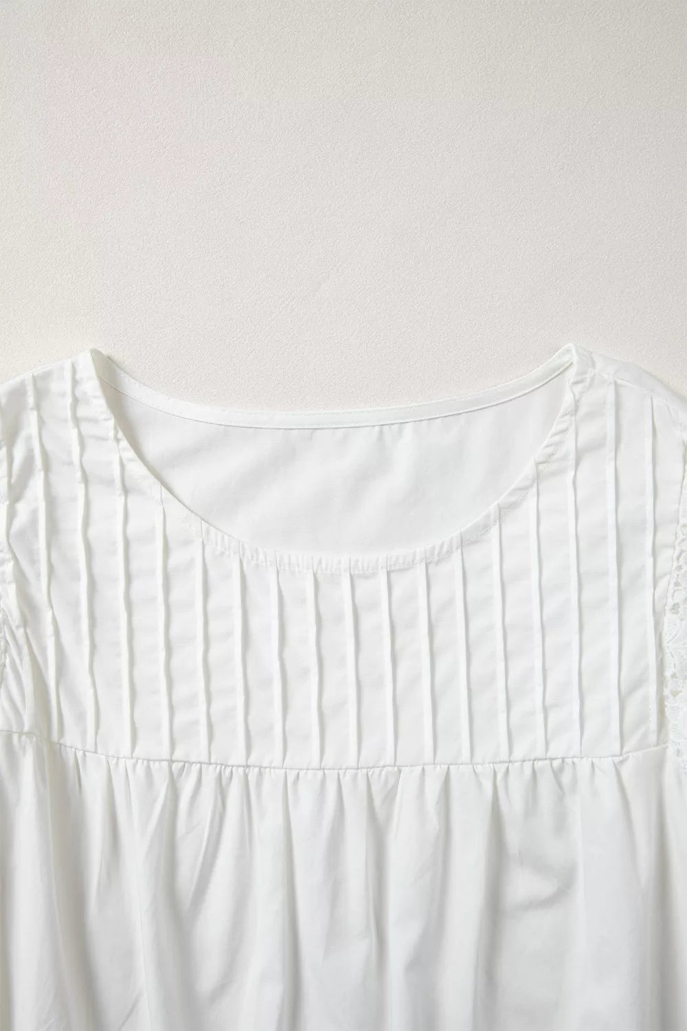 Lace flutter sleeve pintuck yoke round neck blouse