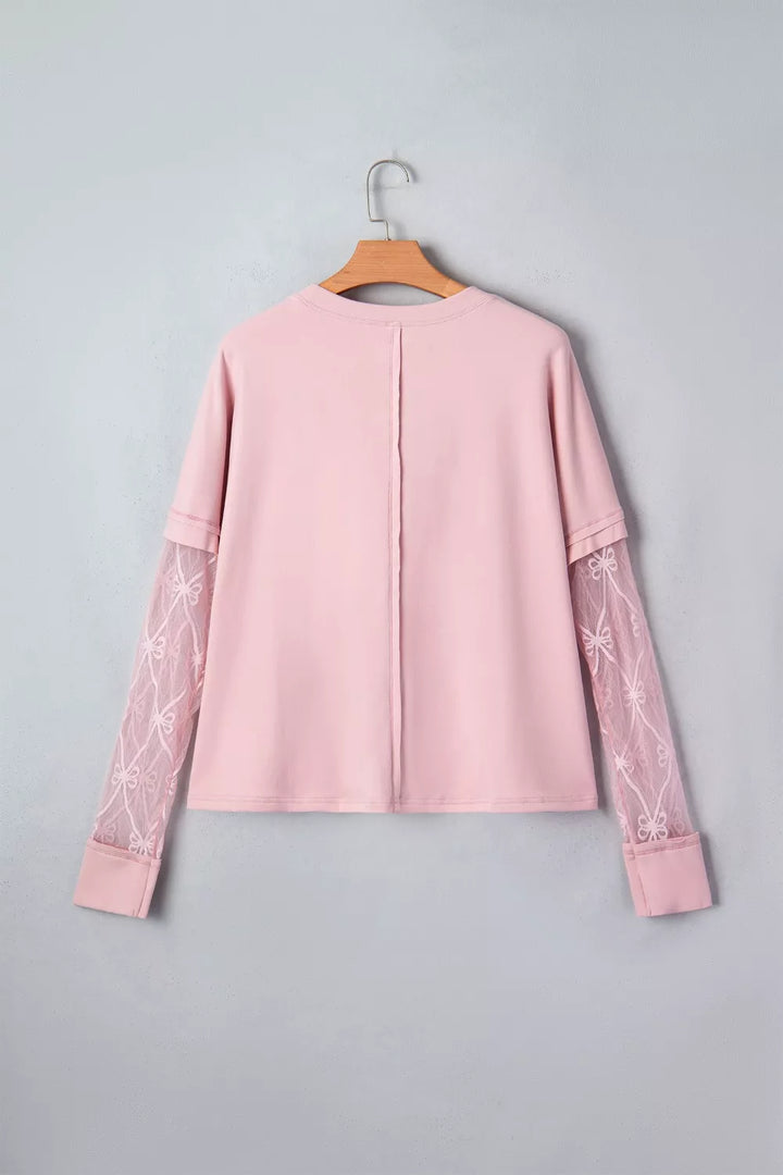 Crew neck top with bow-embroidered sheer lace sleeves