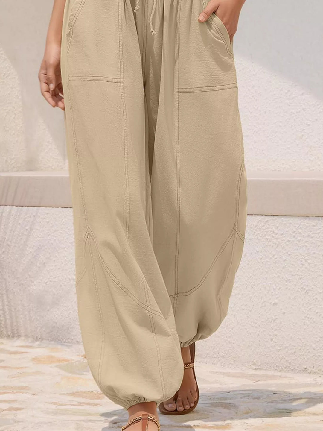 Drawstring waist wide-leg harem joggers with side pockets