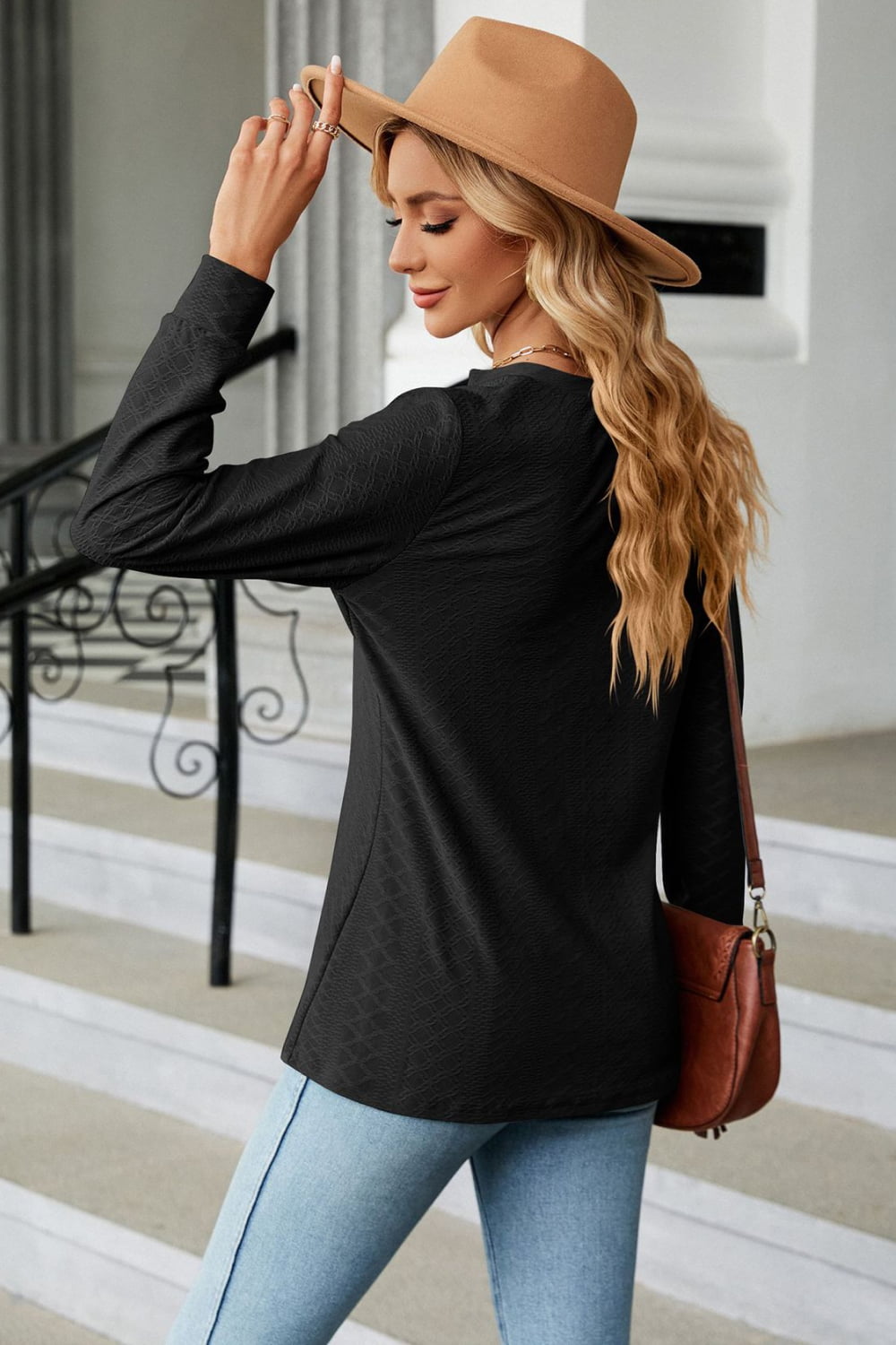 Textured knit long sleeve top with button placket