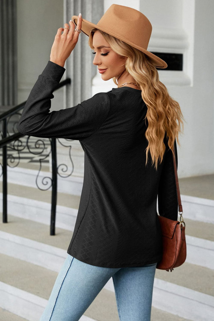 Textured knit long sleeve top with button placket