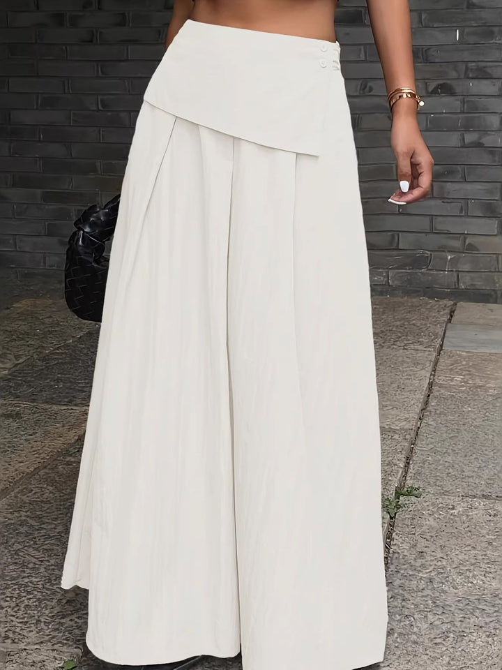 Pleated high-waist maxi skirt with button-front overlay
