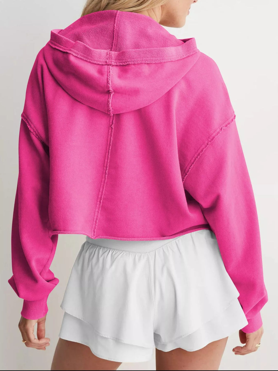 Cropped exposed-seam pullover hoodie with split neck