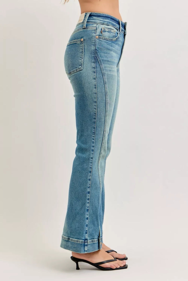 High-rise vintage wash flare jeans with released hem