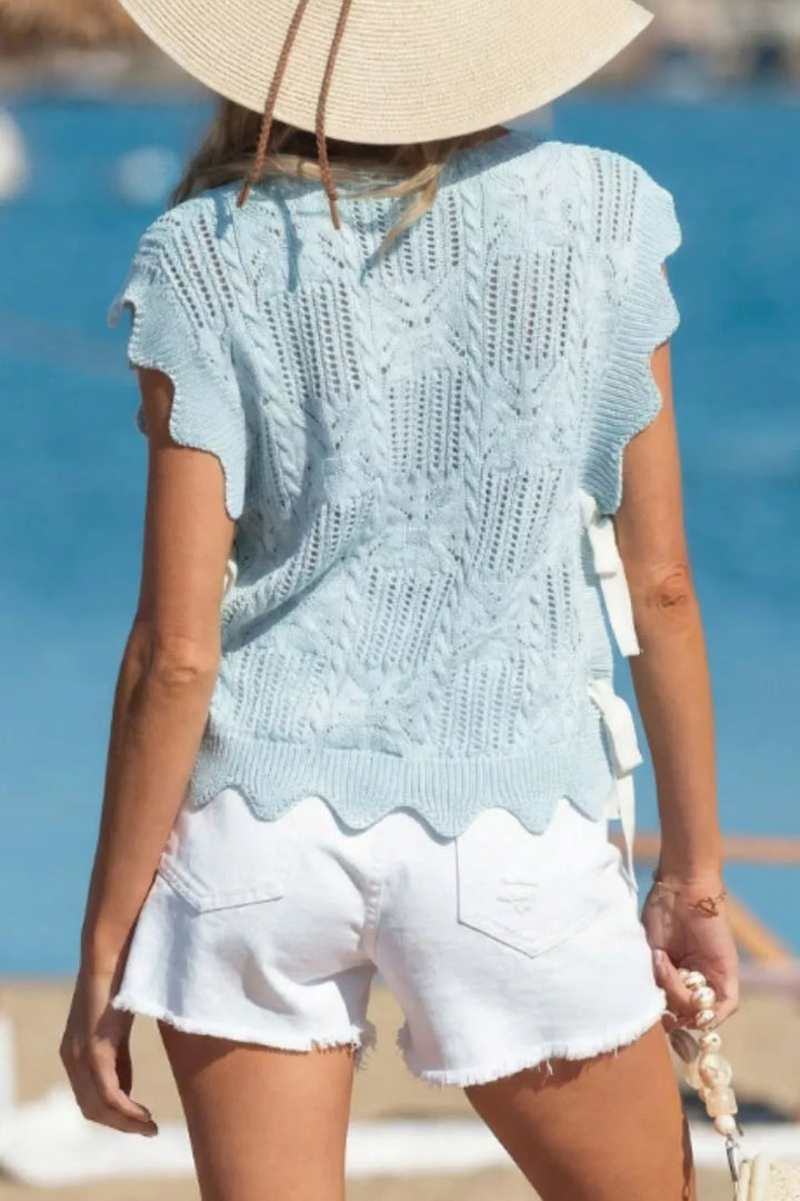 Cable-knit openwork sleeveless top with side ties