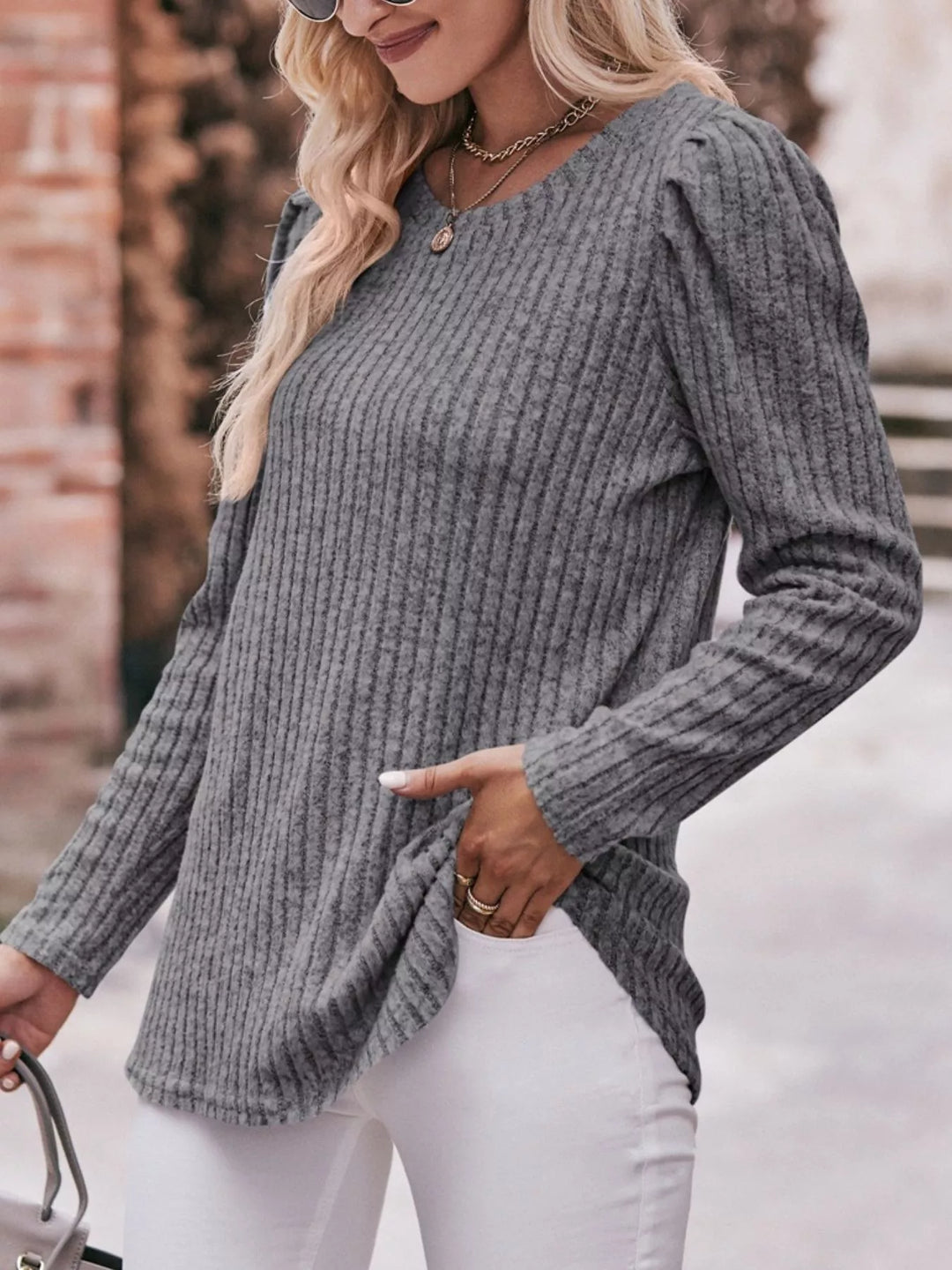 Ribbed knit long sleeve top with puff shoulders