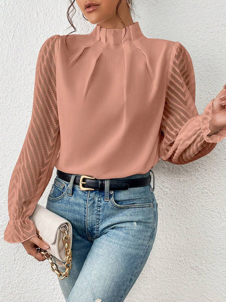 Mock neck blouse with sheer textured flounce sleeves