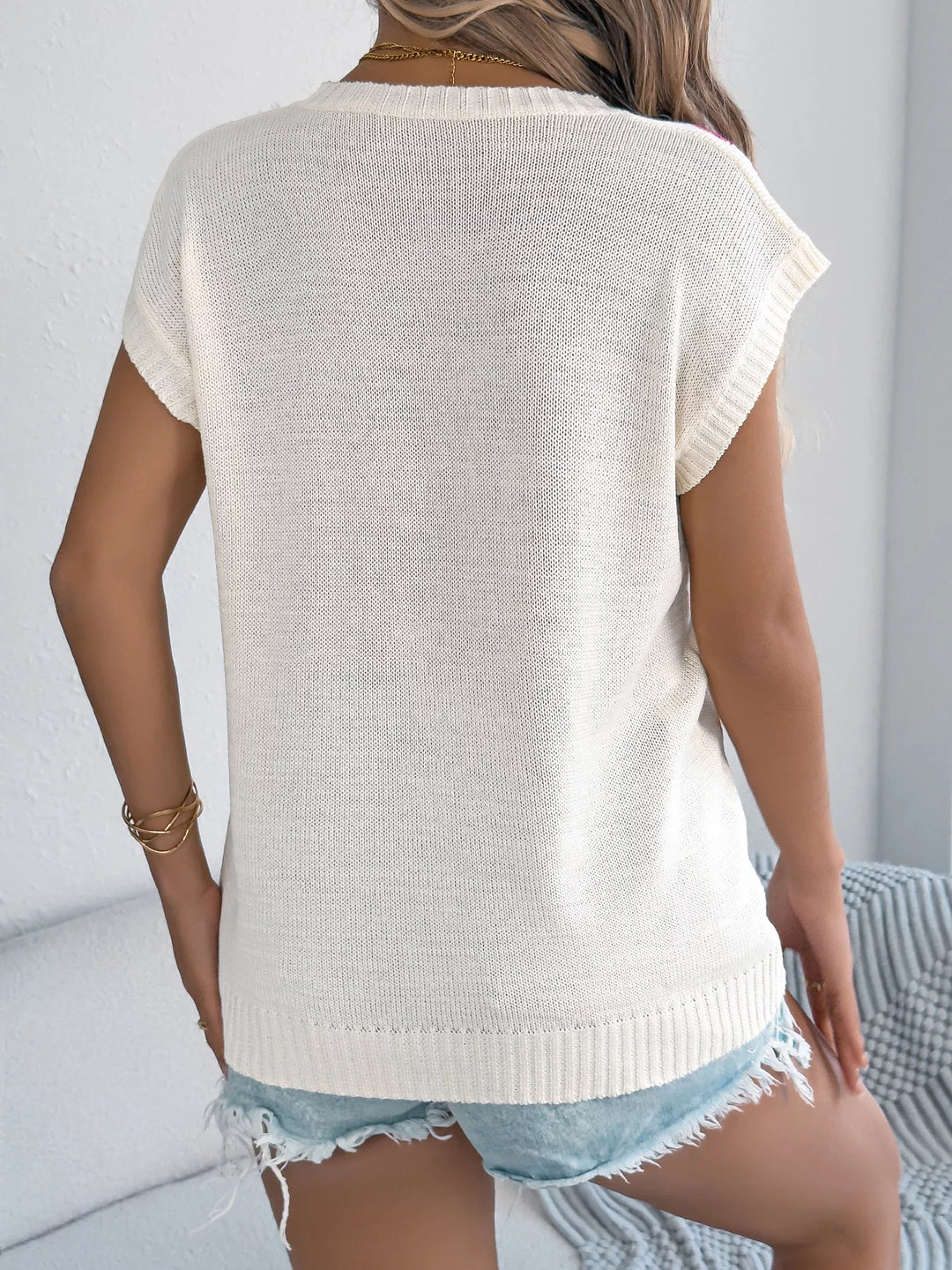 Floral cap-sleeve knit sweater with ribbed crew neck