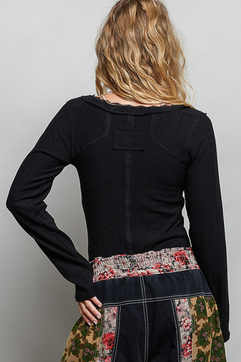 Ribbed knit v-neck long sleeve top with lace trim