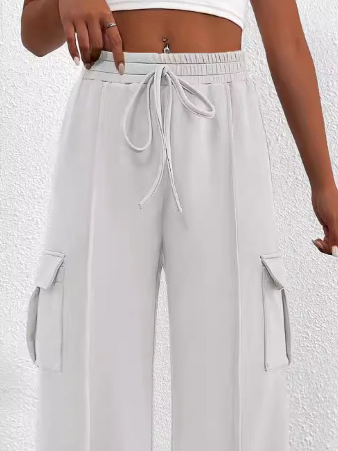 Drawstring high-waist wide-leg cargo pants with flap pockets