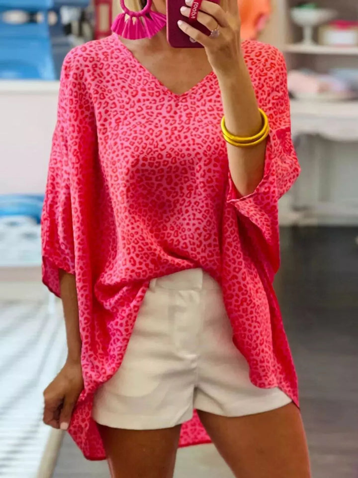 Leopard print tie-front V-neck blouse with dolman sleeves