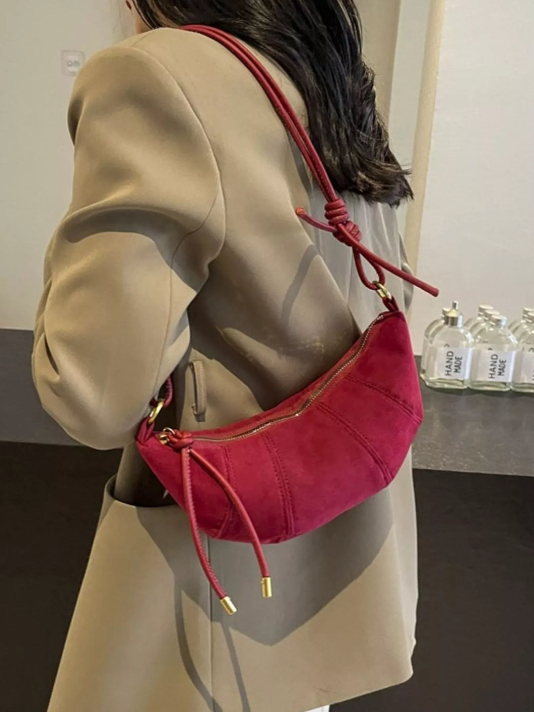 Crescent suede-look crossbody bag with knotted strap