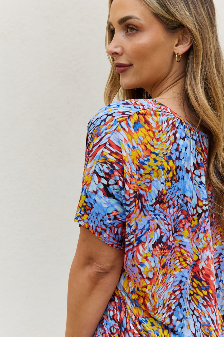 Abstract print dolman sleeve flowy V-neck top