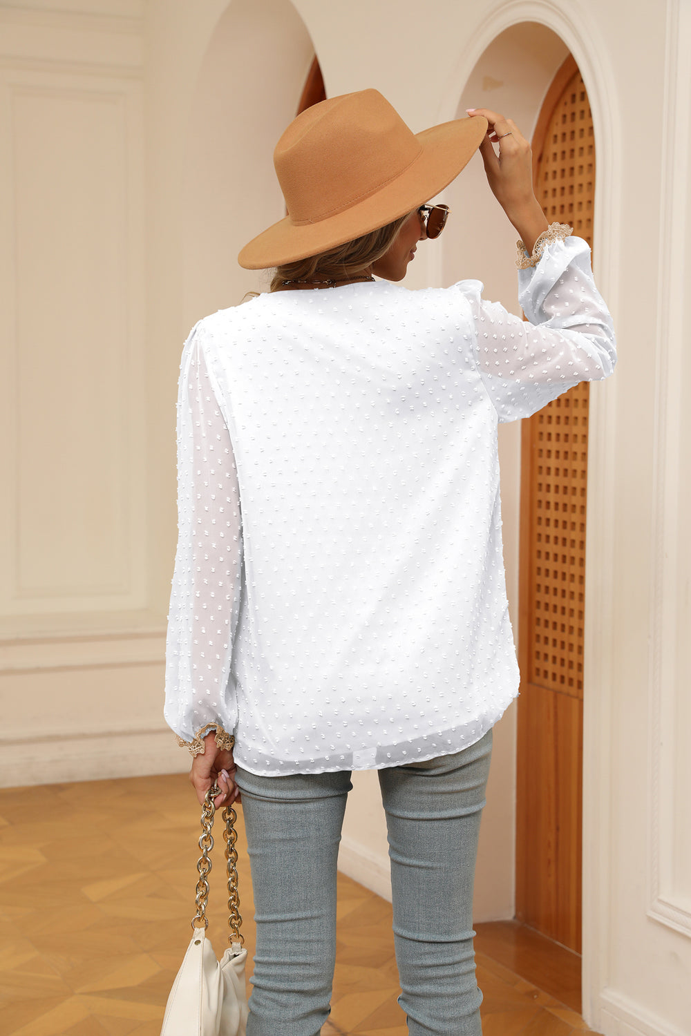 Swiss dot V-neck blouse with crochet lace trim and cuffs