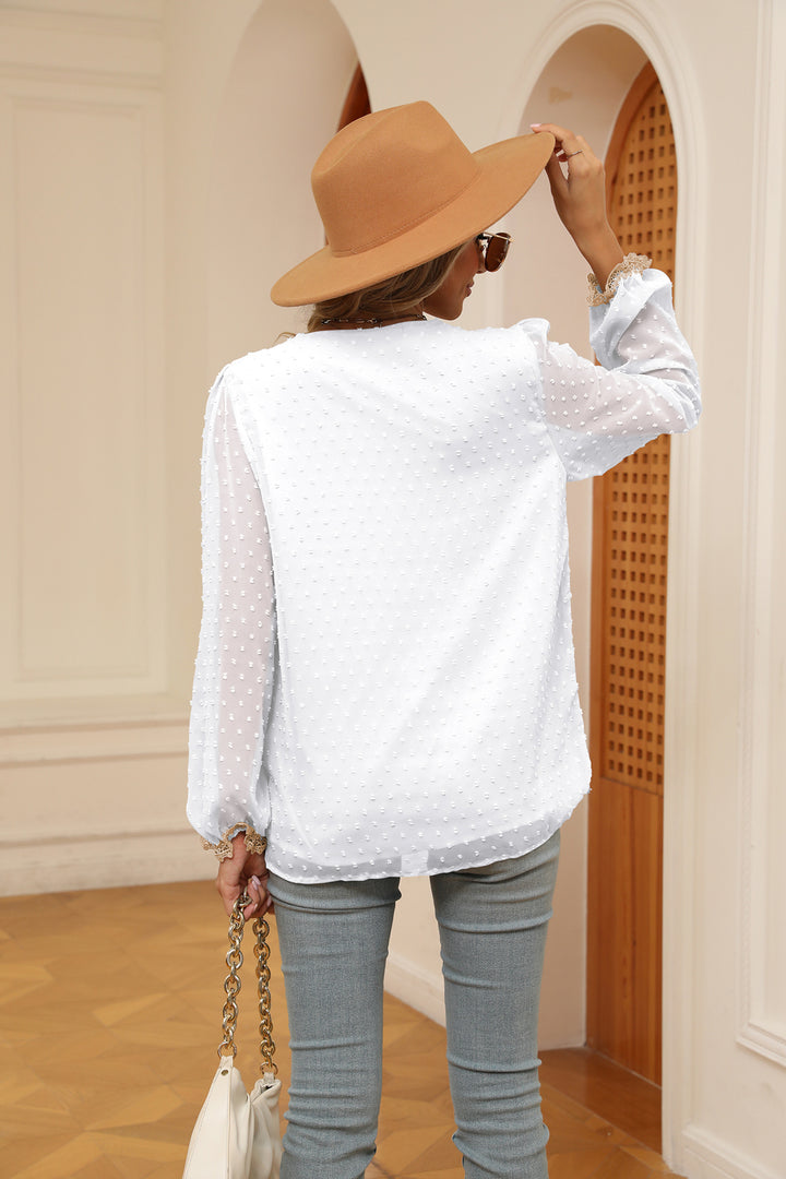 Swiss dot V-neck blouse with crochet lace trim and cuffs