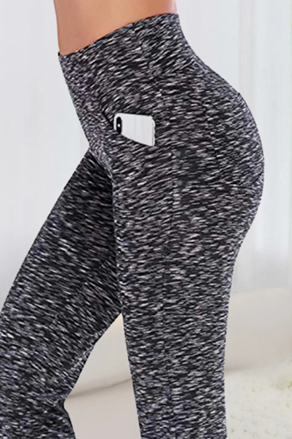 High-waisted flare yoga pants with side phone pockets