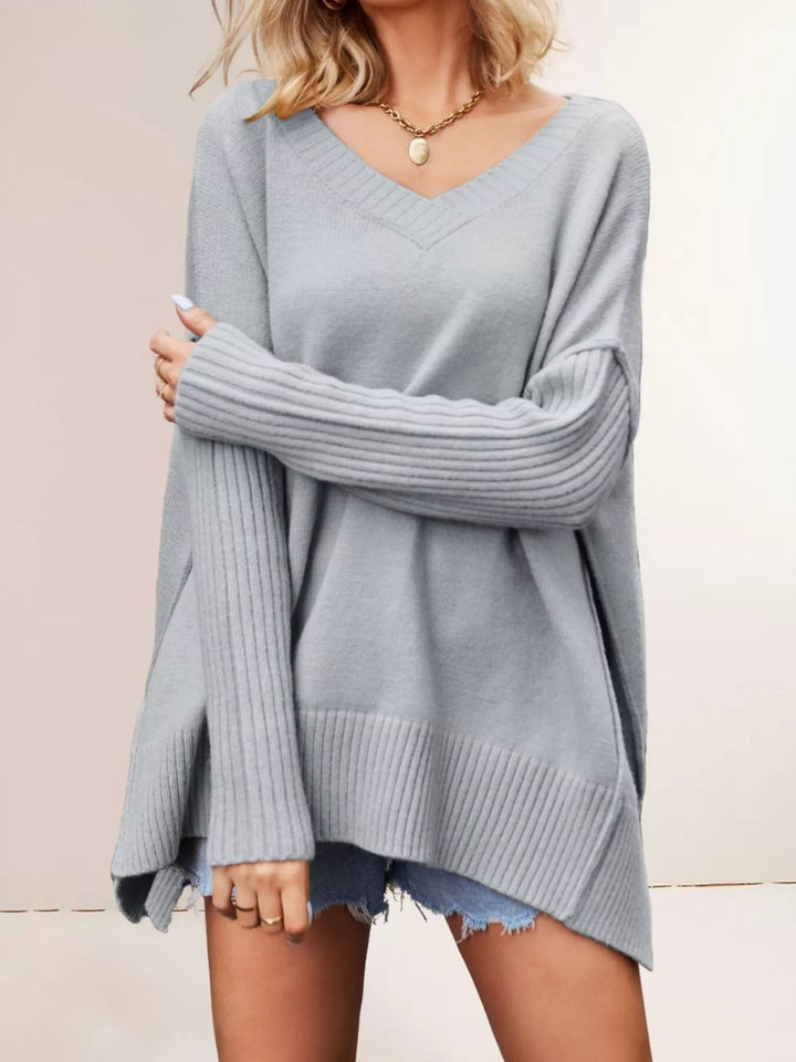 Oversized ribbed-sleeve V-neck tunic sweater with side slits