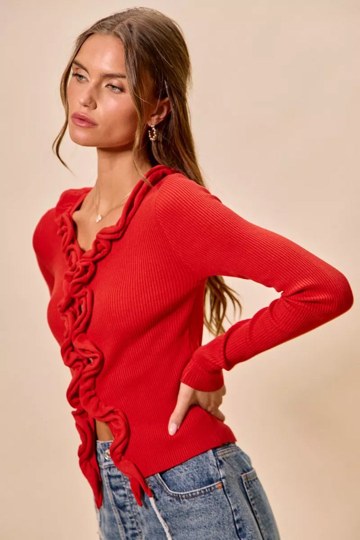 Ribbed knit cardigan with cascade ruffle trim