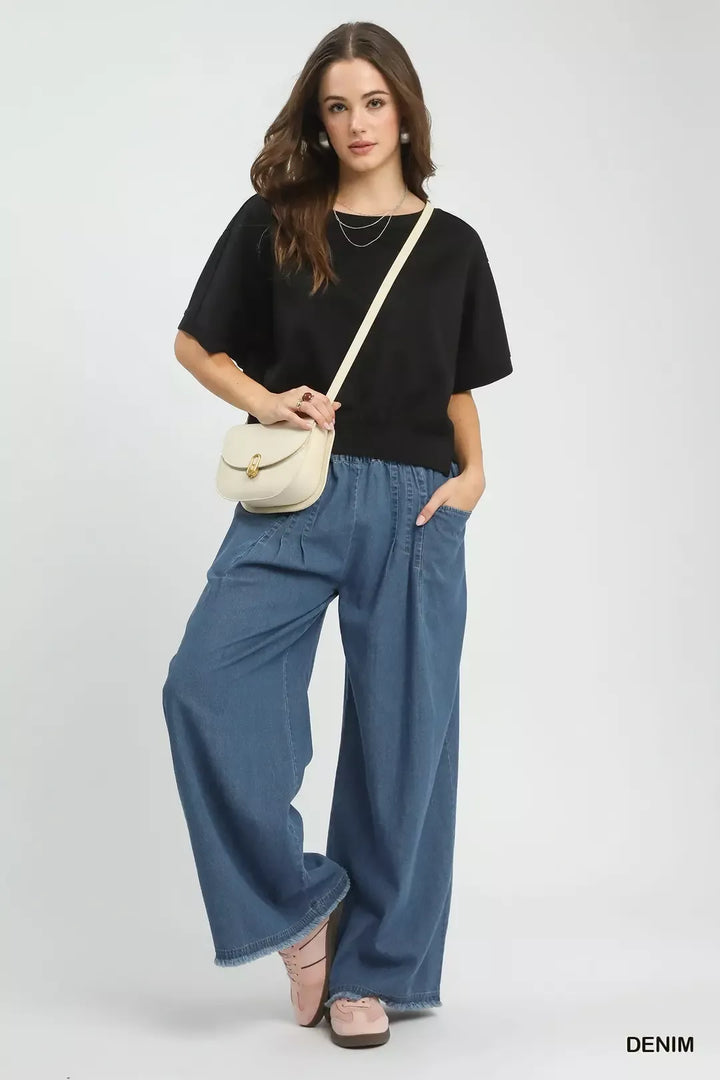 Stone washed wide leg cotton pants with raw hem