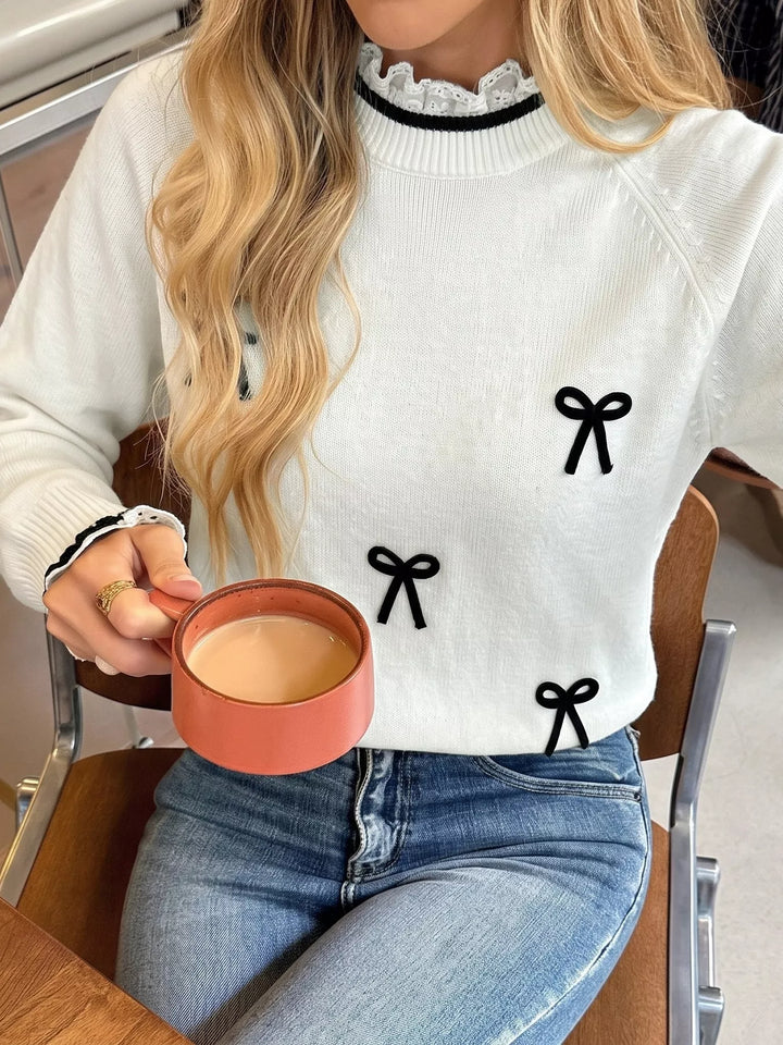 Lace trim mock neck sweater with contrast bow appliqués
