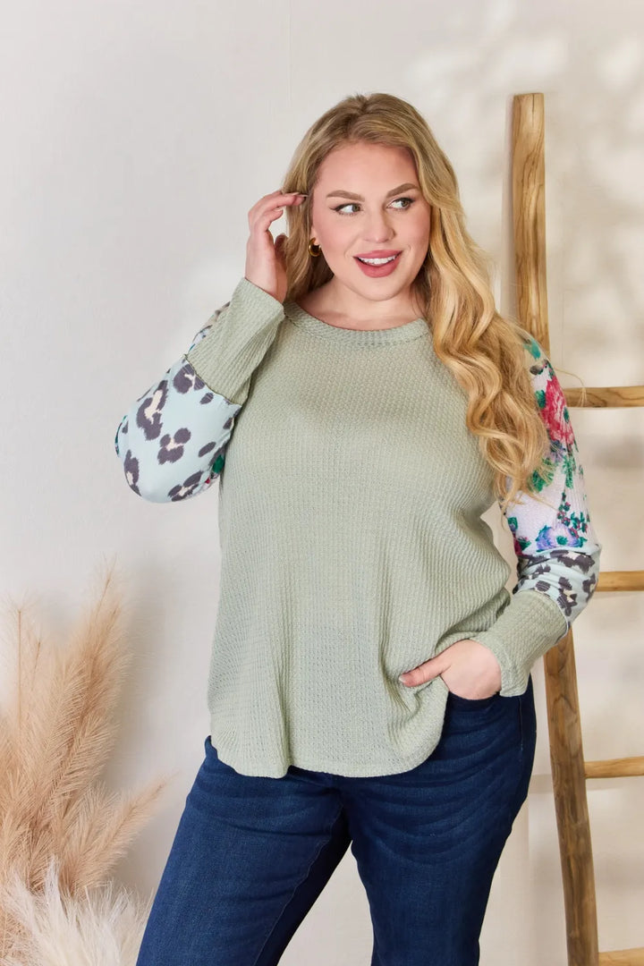 Waffle knit top with floral and leopard print sleeves