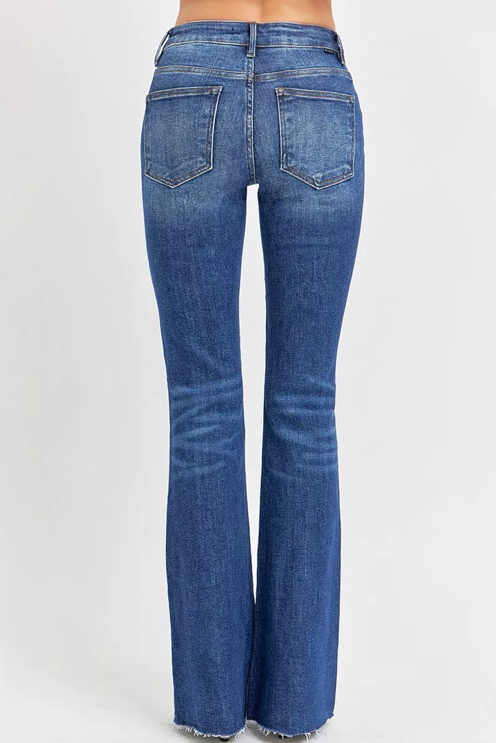Distressed mid-rise flare jeans with raw hem