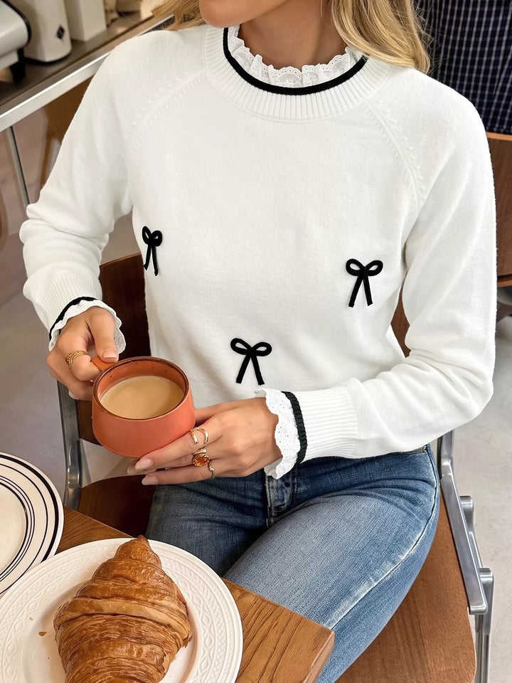 Lace trim mock neck sweater with contrast bow appliqués