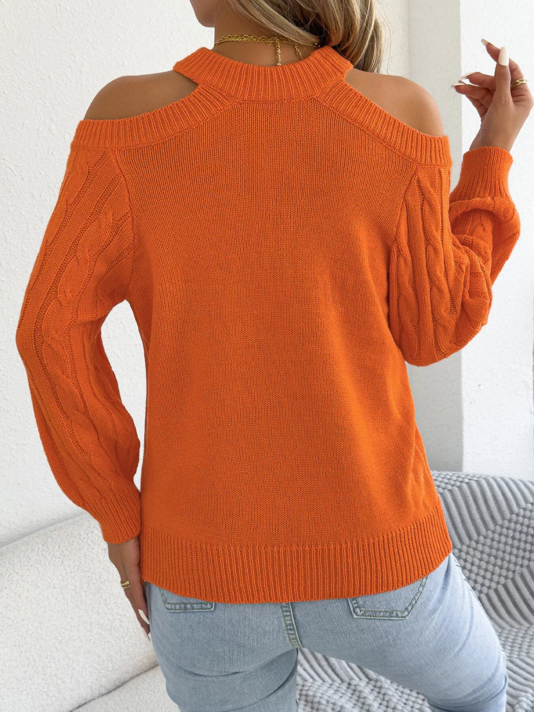 Cold shoulder cable knit mock neck sweater