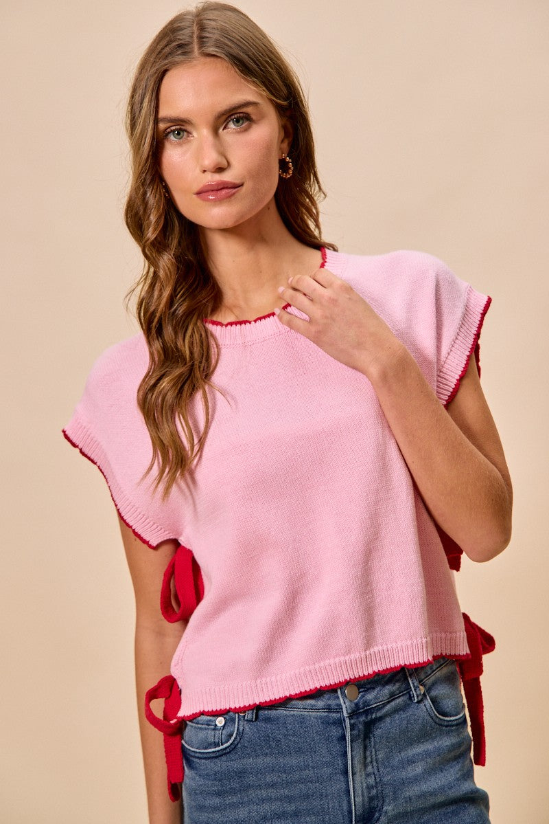 Dolman sleeve knit sweater top with side ribbon ties
