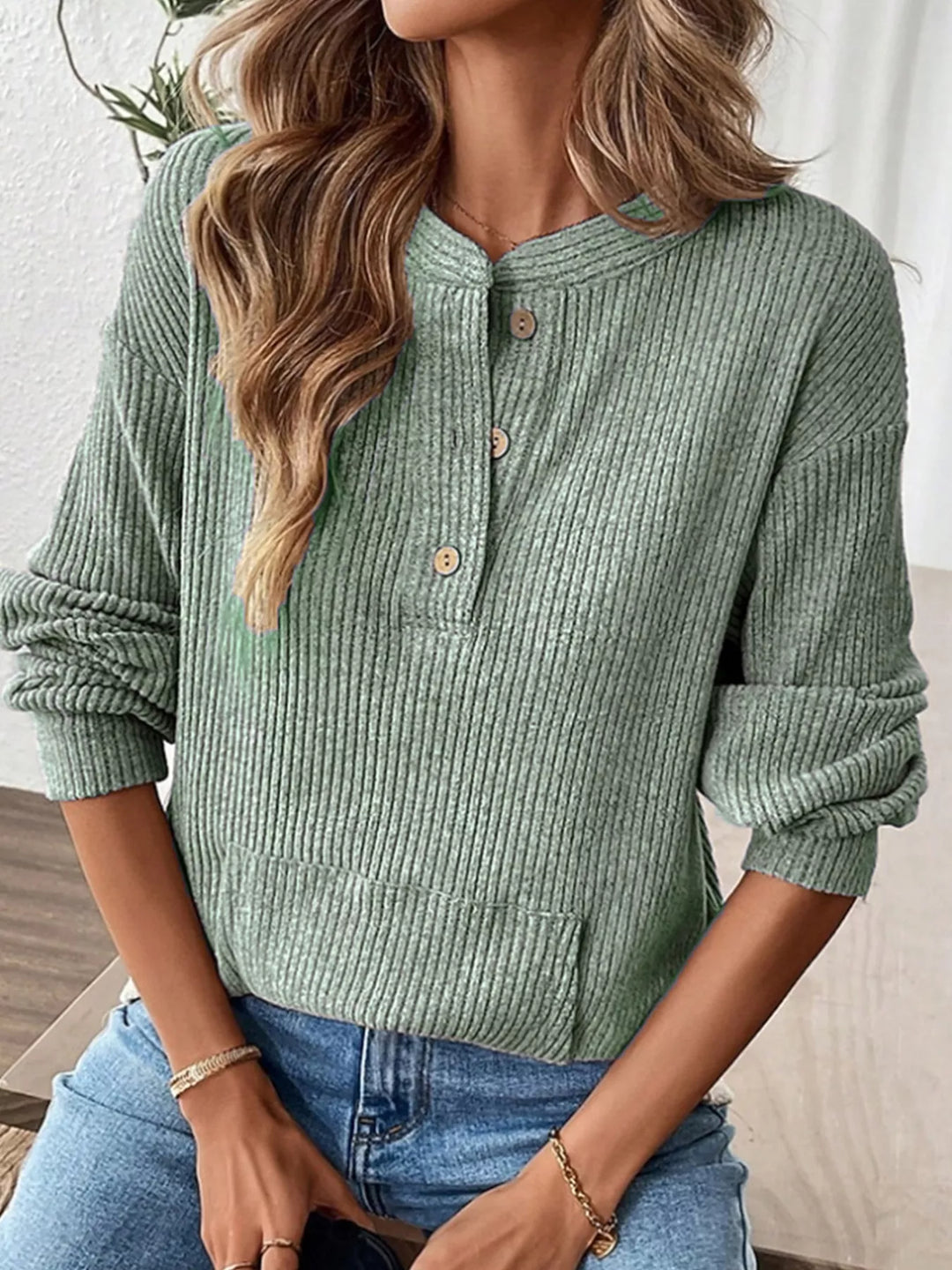 Ribbed knit long sleeve henley top with button placket