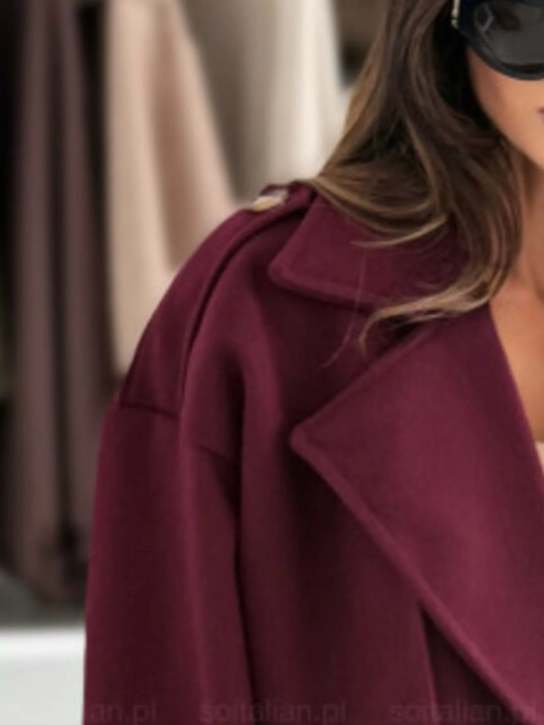 Double-breasted cropped coat with notch lapels and button cuffs